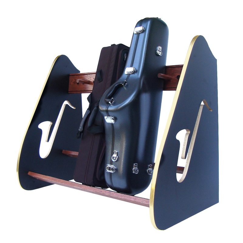 Two saxophone cases in a wooden rack that features bronze edging